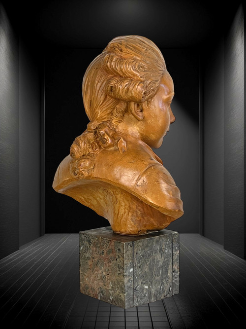 BUSTO DI BAMBINO SECONDO SOGGETTO "PAJOU" IN TERRACOTTA SU BASE IN MARMO