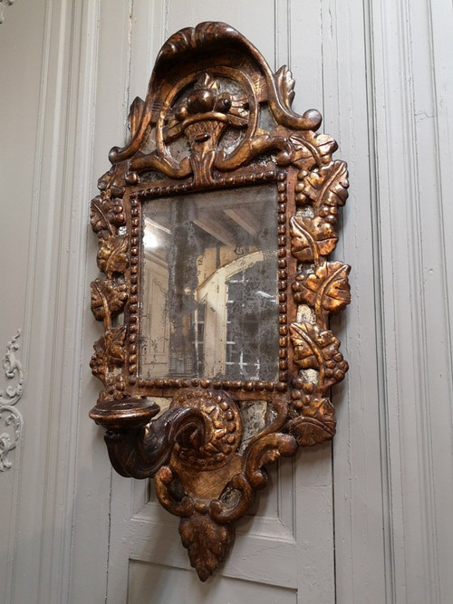 Italian Mirror With Arms Of Light In Carved And Gilded Wood. 18th century period
