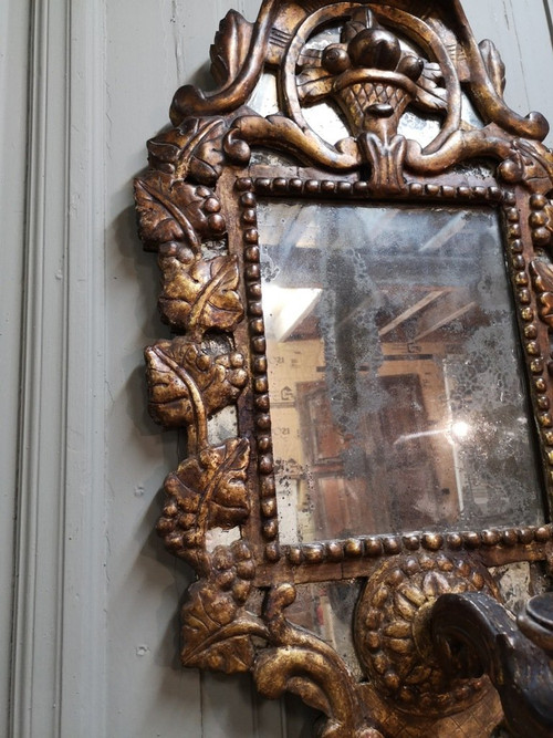 Italian Mirror With Arms Of Light In Carved And Gilded Wood. 18th century period