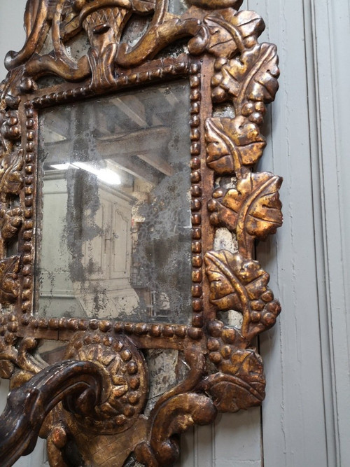 Italian Mirror With Arms Of Light In Carved And Gilded Wood. 18th century period