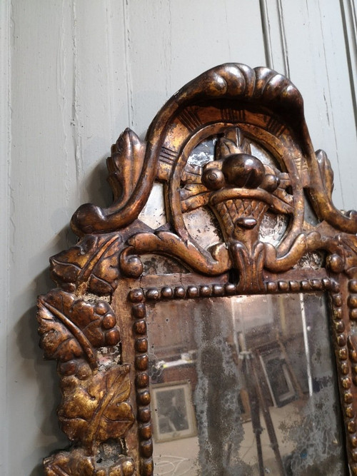 Italian Mirror With Arms Of Light In Carved And Gilded Wood. 18th century period