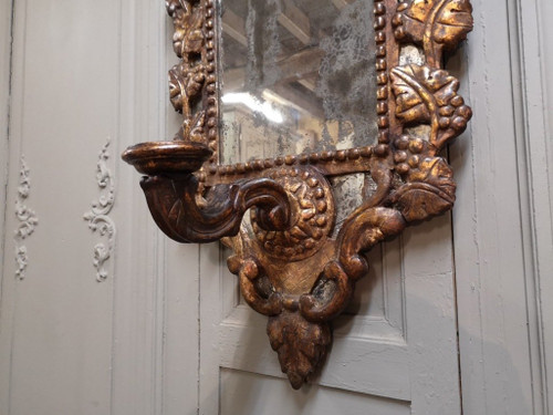 Italian Mirror With Arms Of Light In Carved And Gilded Wood. 18th century period