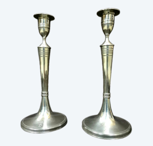 Coppia di candelieri corazzati del periodo impero in argento sterling