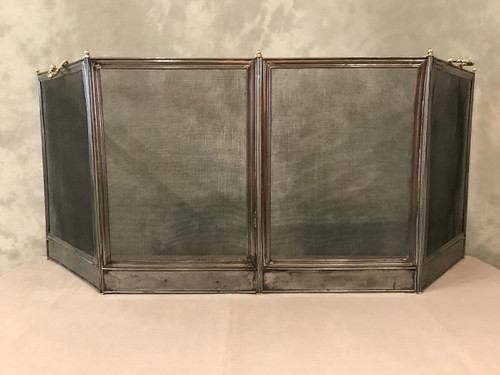Antique polished iron mantelpiece from the 19th century Charles X period