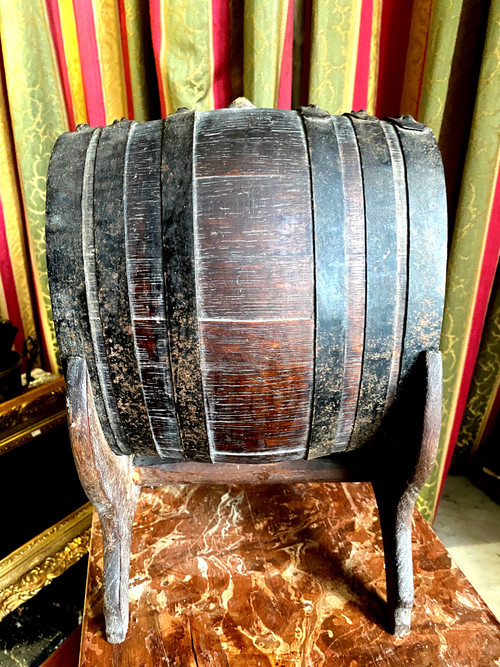 Oak vinegar table barrel from the end of the 19th century on its lightning-shaped tripod