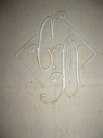 Old embroidered sheet in monogrammed linen