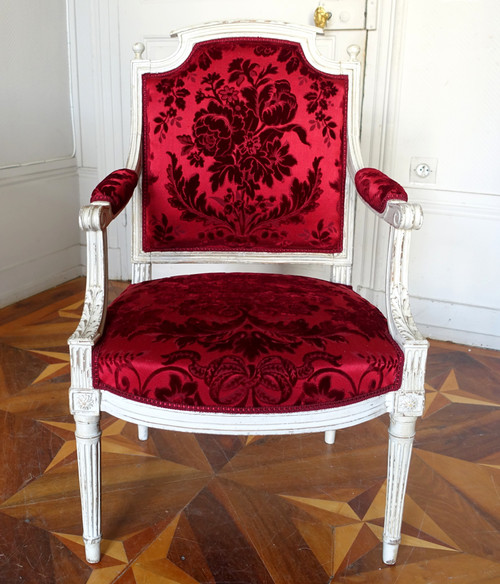Poltrona da scrivania di epoca Luigi XVI in legno intagliato e velluto di Genova