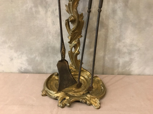 Beautiful large bronze fireplace set from the 19th century in Louis XV style