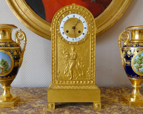 Orologio terminale in bronzo cesellato e dorato epoca Restaurazione Impero Primavera - 35,5 cm
