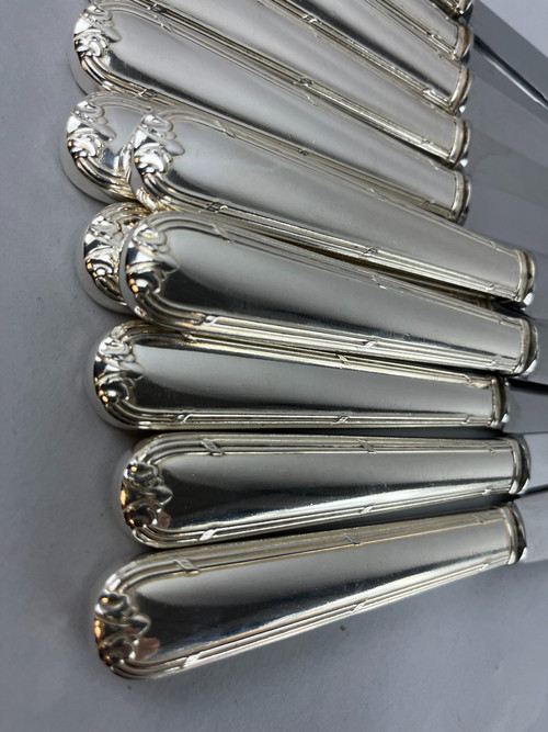 12 Tafelmesser aus versilbertem Metall Band