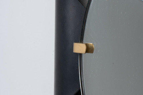 Specchio in metallo curvato e ottone dorato. Anni '70.