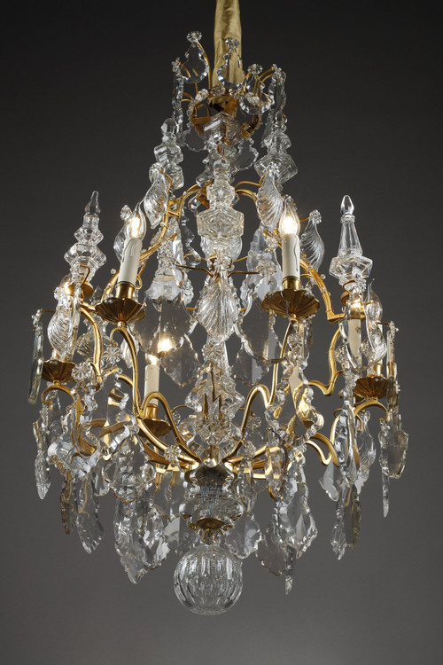 Lampadario a gabbia a sei luci, in bronzo dorato, decorato con nappe e pugnali in cristallo molato