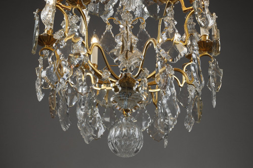 Lampadario a gabbia a sei luci, in bronzo dorato, decorato con nappe e pugnali in cristallo molato
