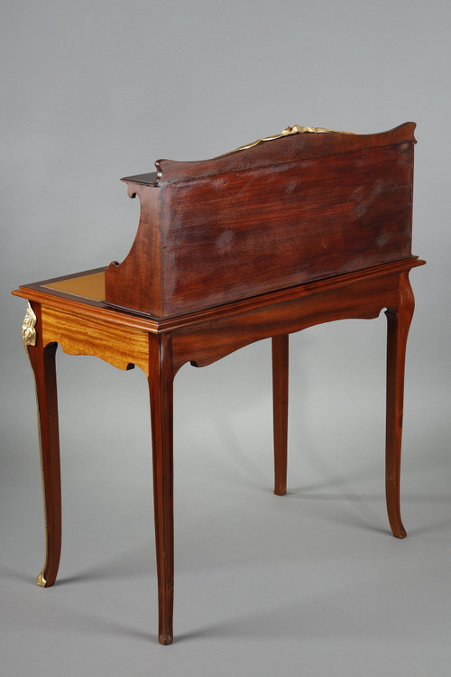 ART NOUVEAU MAHOGANY AND MAHOGANY VENEER STEPPED DESK