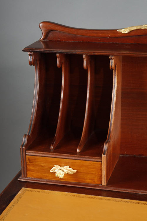 ART NOUVEAU MAHOGANY AND MAHOGANY VENEER STEPPED DESK