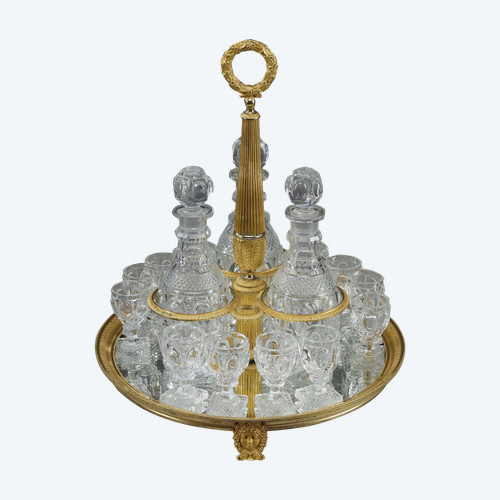 Servizio da liquore in bronzo dorato e cristallo molato del periodo Carlo X