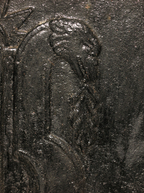 Large cast-iron fireback from the 18th century decorated with coat of arms and lyre