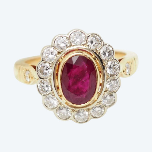 Anello in oro giallo, rubini e diamanti
