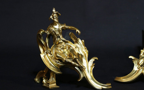 Pair of chiseled gilded bronze andirons