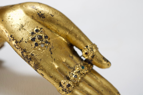 Mano di Buddha in bronzo dorato