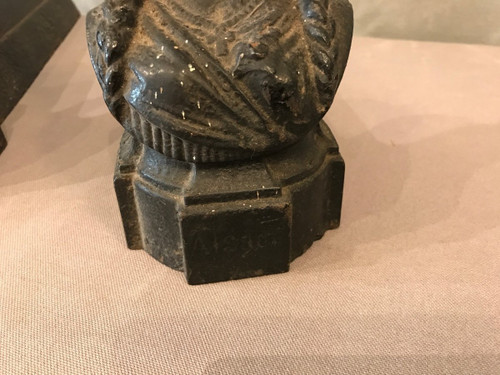 Pair of old cast iron andirons from the 19th century