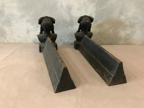 Pair of old cast iron andirons from the 19th century