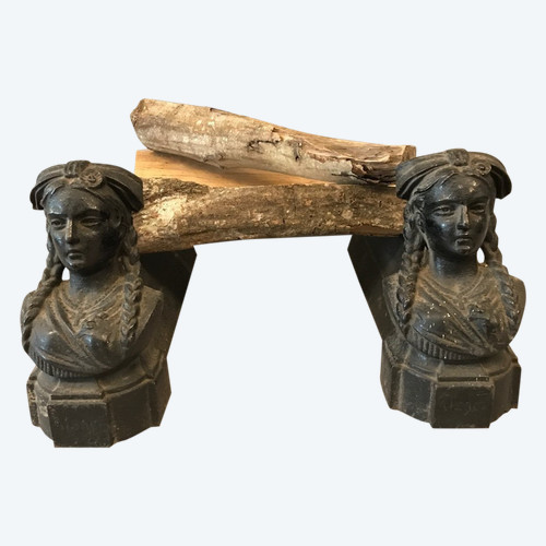 Pair of old cast iron andirons from the 19th century