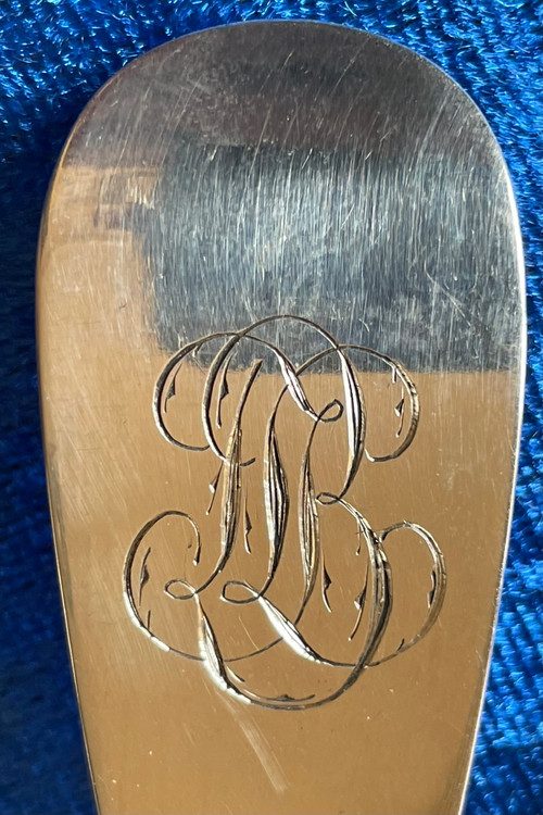 Solid silver shaker.