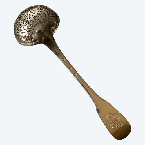Solid silver shaker.