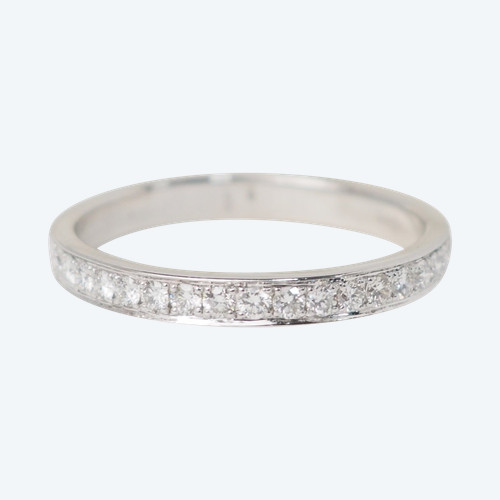 Anello nuziale in oro bianco e diamanti