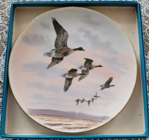 Set of 12 game and feather hunting plates