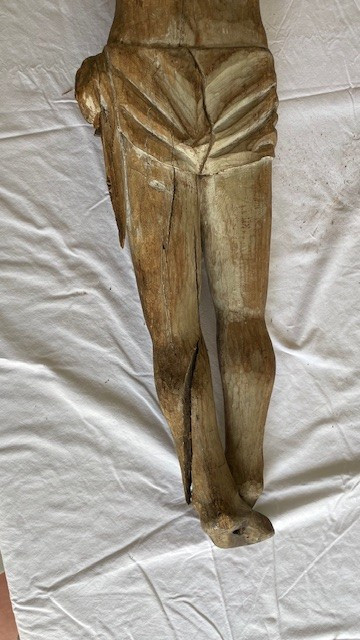 Christ of the crucifixion carved wooden figure with traces of polychromy