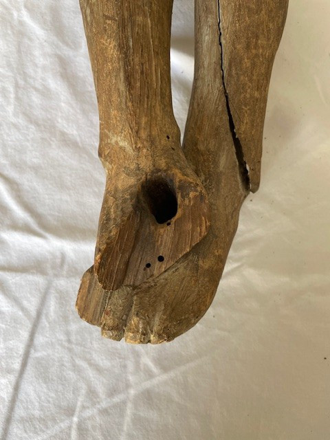 Christ of the crucifixion carved wooden figure with traces of polychromy