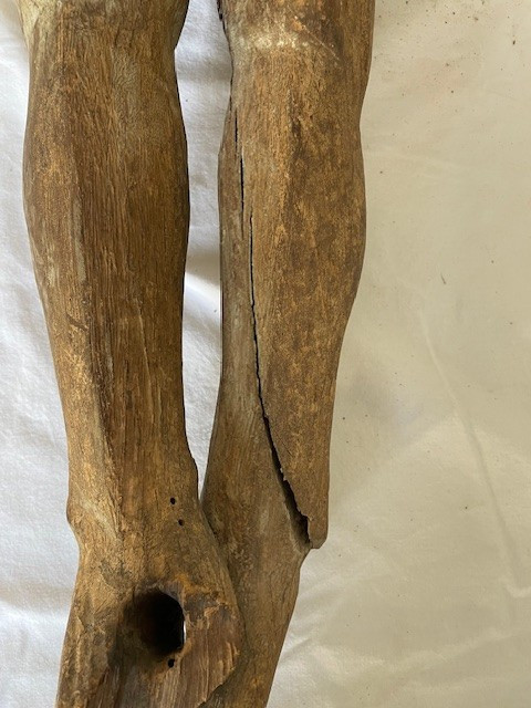 Christ of the crucifixion carved wooden figure with traces of polychromy