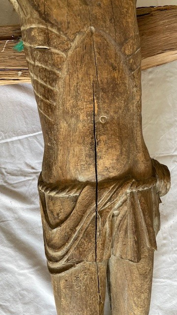 Christ of the crucifixion carved wooden figure with traces of polychromy