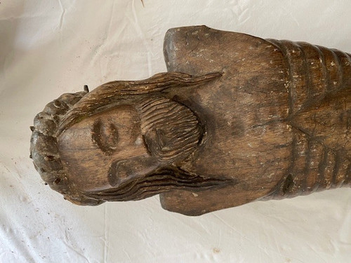 imposing carved and polychromed oak christ.