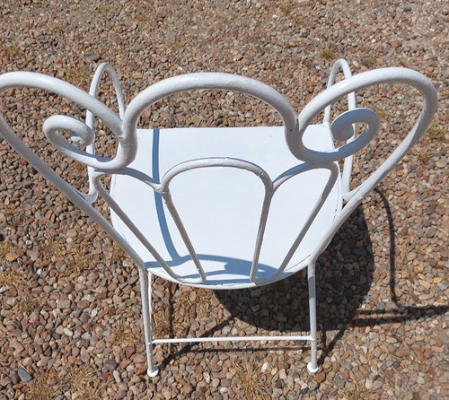 Fauteuil de jardin en fer forgé assise aussi début 1900 