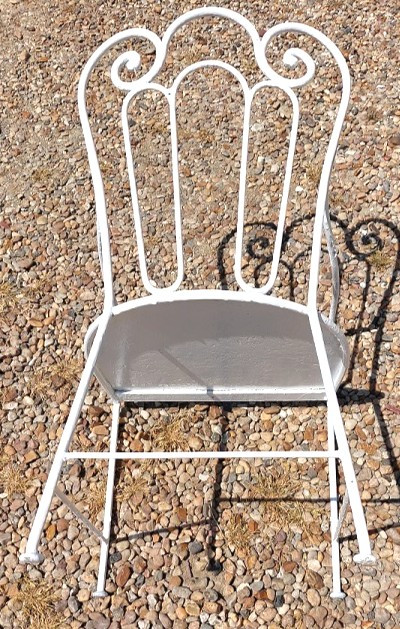 Fauteuil de jardin en fer forgé assise aussi début 1900 