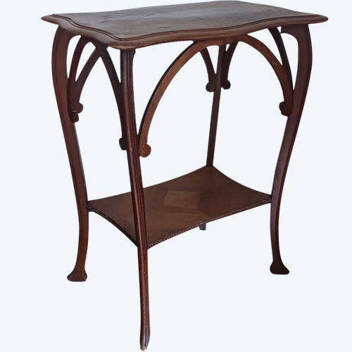 Art Nouveau work - walnut saddle table with spacer - circa 1900