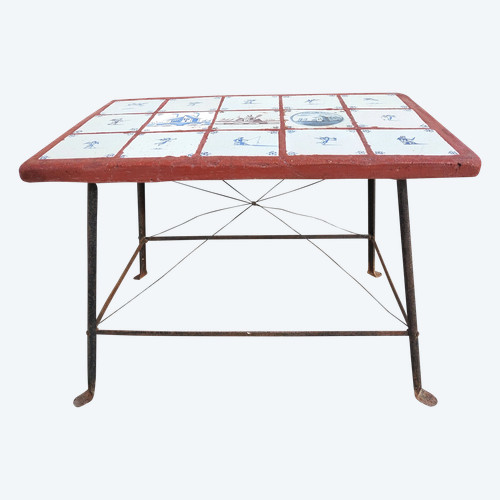 Iron coffee table from the 60's with 19th century Delft tile top