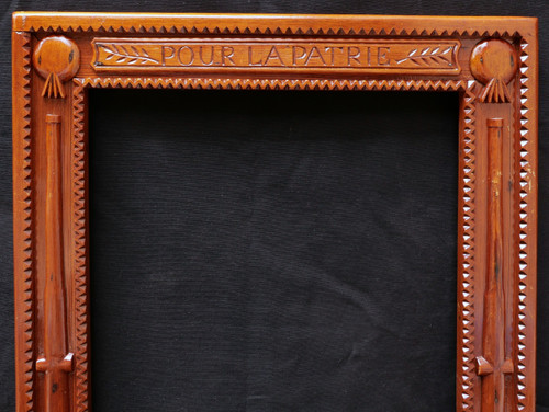 Patriotic frame in carved pitchpin