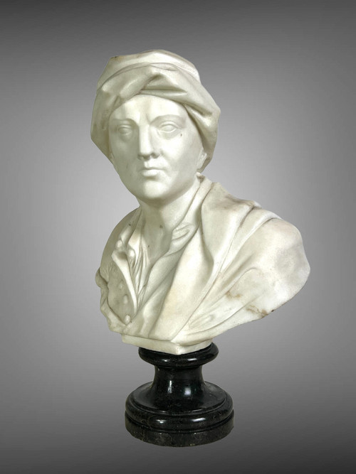 BUSTO ANTICO IN MARMO BIANCO SCOLPITO MONTATO SU UNA BASE IN MARMO NERO
