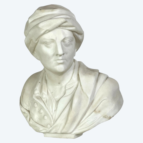 BUSTO ANTICO IN MARMO BIANCO SCOLPITO MONTATO SU UNA BASE IN MARMO NERO