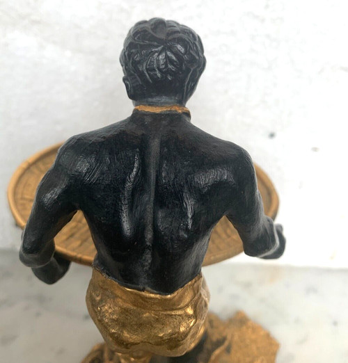 "Uomo con cesto intrecciato" gruppo in bronzo con doppia patina XX secolo