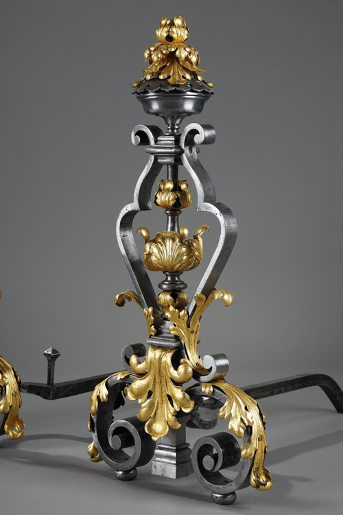 VERY LARGE PAIR OF WROUGHT IRON MANTELPIECES WITH FOLIAGE, MASK AND SCROLL MOTIFS