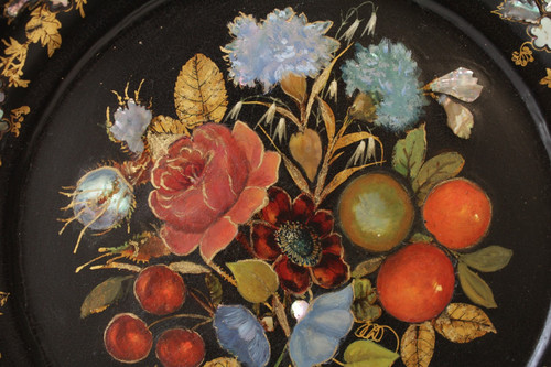 Rounded platter in painted black pressed material with mother-of-pearl inlay late 19th century