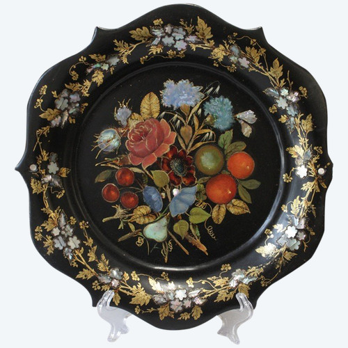Rounded platter in painted black pressed material with mother-of-pearl inlay late 19th century