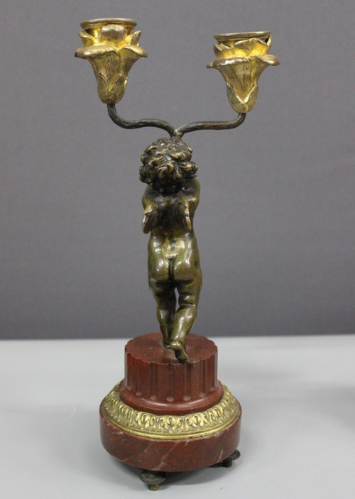 Borne Clock Surmounted by a Putti About 1880