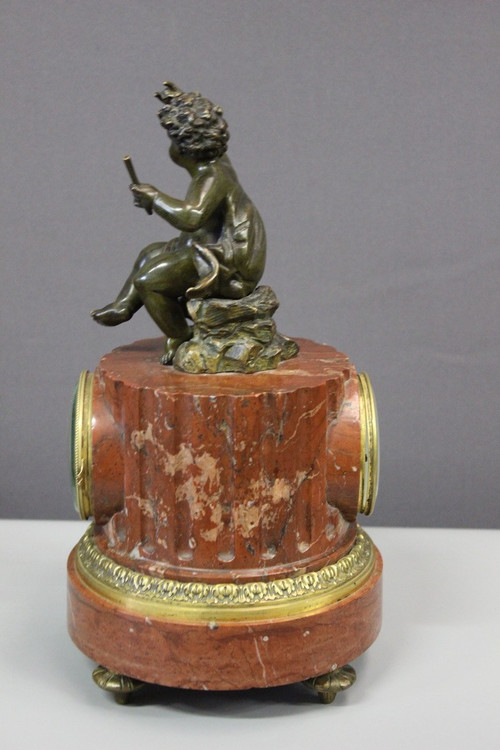 Borne Clock Surmounted by a Putti About 1880