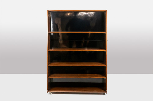 Libreria bifacciale con rotelle in palissandro. Circa 1960. LS58761008H